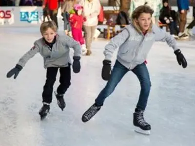 young boys ice skating