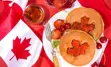 pancakes with fruit and Canada flags
