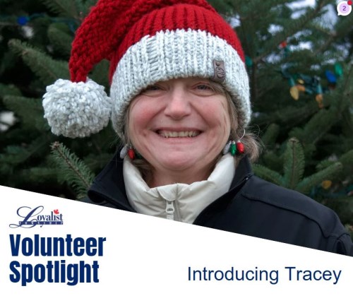 lady in red and white wooly hat