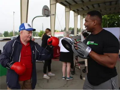 Senior participating in boxing