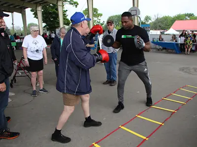 Senior trying boxing