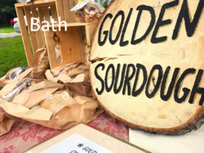 golden sourdough sign in Bath market